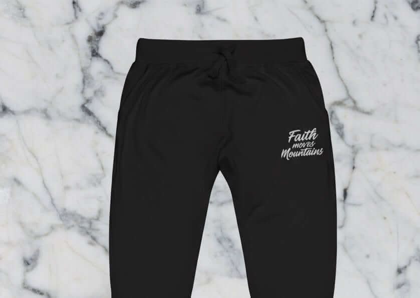 Faith Moves Mountains Joggers in Black , perfect for inspirational and comfortable everyday wear.