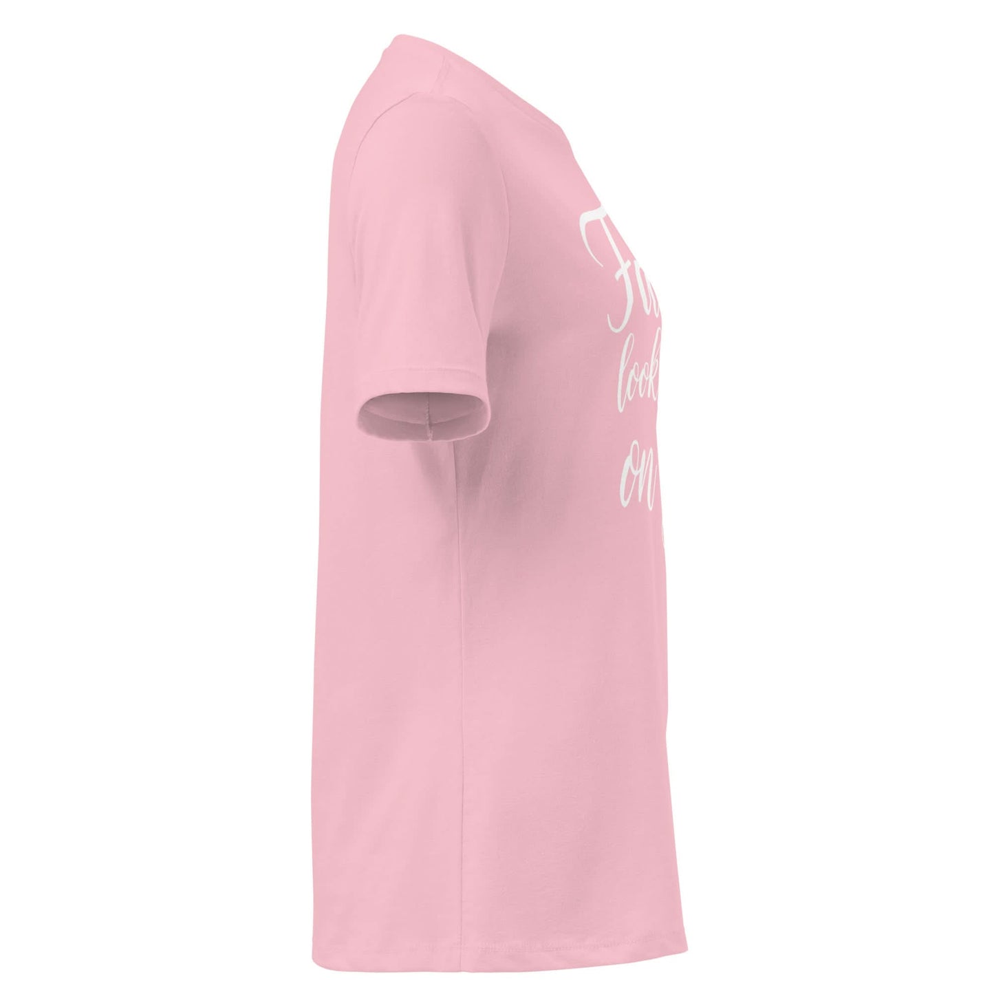 Side view of the Faith Looks Good on You Tee in pink with white cursive lettering.